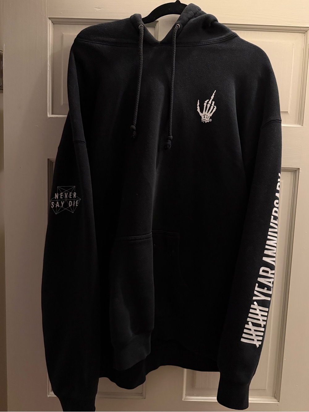Never Say Die Merch Black Graphic Hoodie Sweatshirt with Skeleton Hand Logo